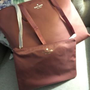 New with tags Kate Spade bag with small bag inside. The material is nylon